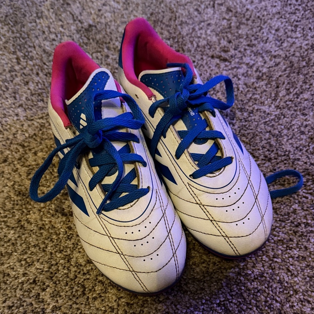 Kids White and Blue adidas soccer cleats with Pink Accents